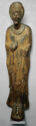 Wooden sculpture of a woman with a large headpiece