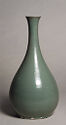 A gray-green vase-shaped bottle curving outward at its base, and narrowing to a long neck
