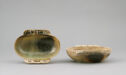Pale green and brown oval-shaped cup