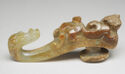 Ornate garment hook with a dragon’s head, its neck is curled up to function as the hook section.　