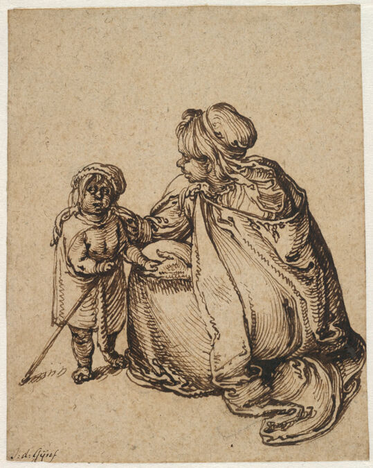 
A woman in profile kneeling and facing a child standing with a walking stick.