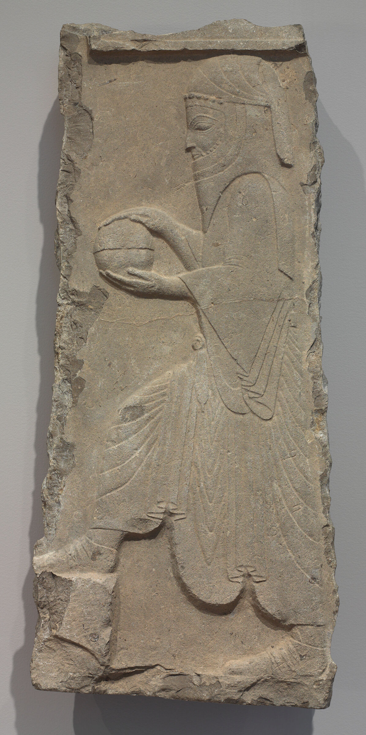 Relief Fragment: Attendant With Covered Bowl