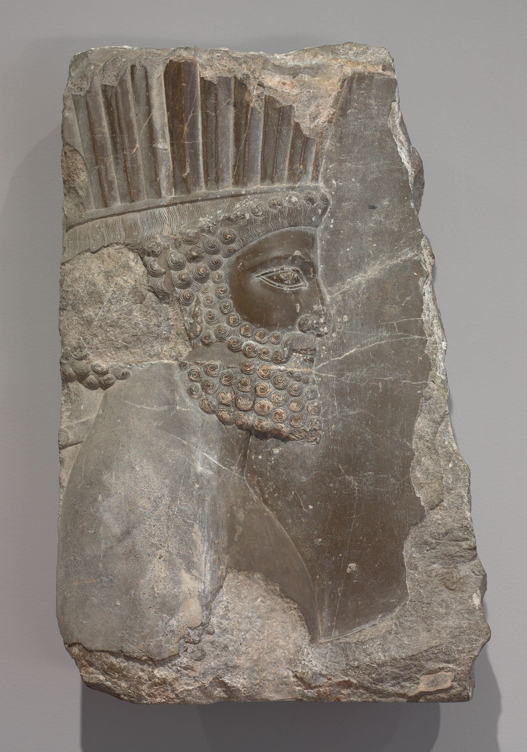 Relief Fragment: Head Of An Archer Of The Royal Guard