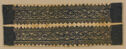 A rectangular textile fragment with a deep violet design on an off-white background showing two long parallel bands with zig-zag edges that contain small roundels depicting lions and hares.