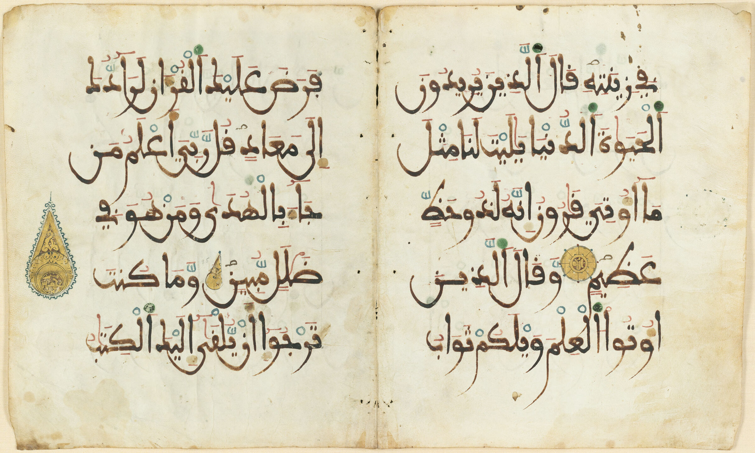 Folio From A Qur'an: Sura 28: Begin 85 - Mid 86 (Recto), Sura 28: Mid 86 - End 87 (Verso), Left-Hand Side Of A Bifolio