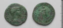 Both sides of an irregularly shaped greenish bronze coin with relief decoration on each side.