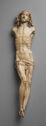 Ivory carving of man in pain. Sculpture has no arms.