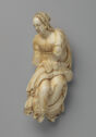 Carved ivory figure of a seated Virgin Mary