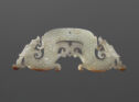 Symmetrical shape pendant of a wide arch, somewhat flat in the middle, it curls upward on both ends.　