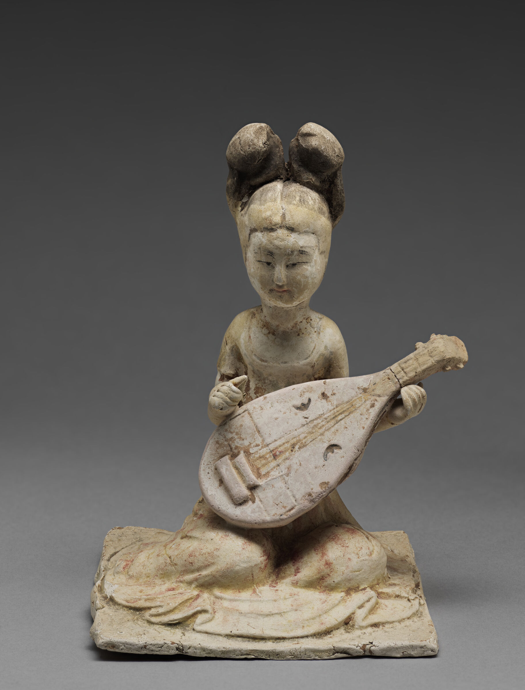 Female Court Musician Holding A 'Pipa', From The Tomb Sculpture Set: Four Kneeling, Female Court Musicians (One With A 'Pipa', Or Lute, And One With Cymbals), Each Of The Four With A High-Waisted, Striped Dress Or Skirt And With Long Hair Arranged In Two Buns