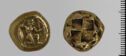 Both sides of an irregularly shaped bronze gold colored coin with relief decoration on each side. 