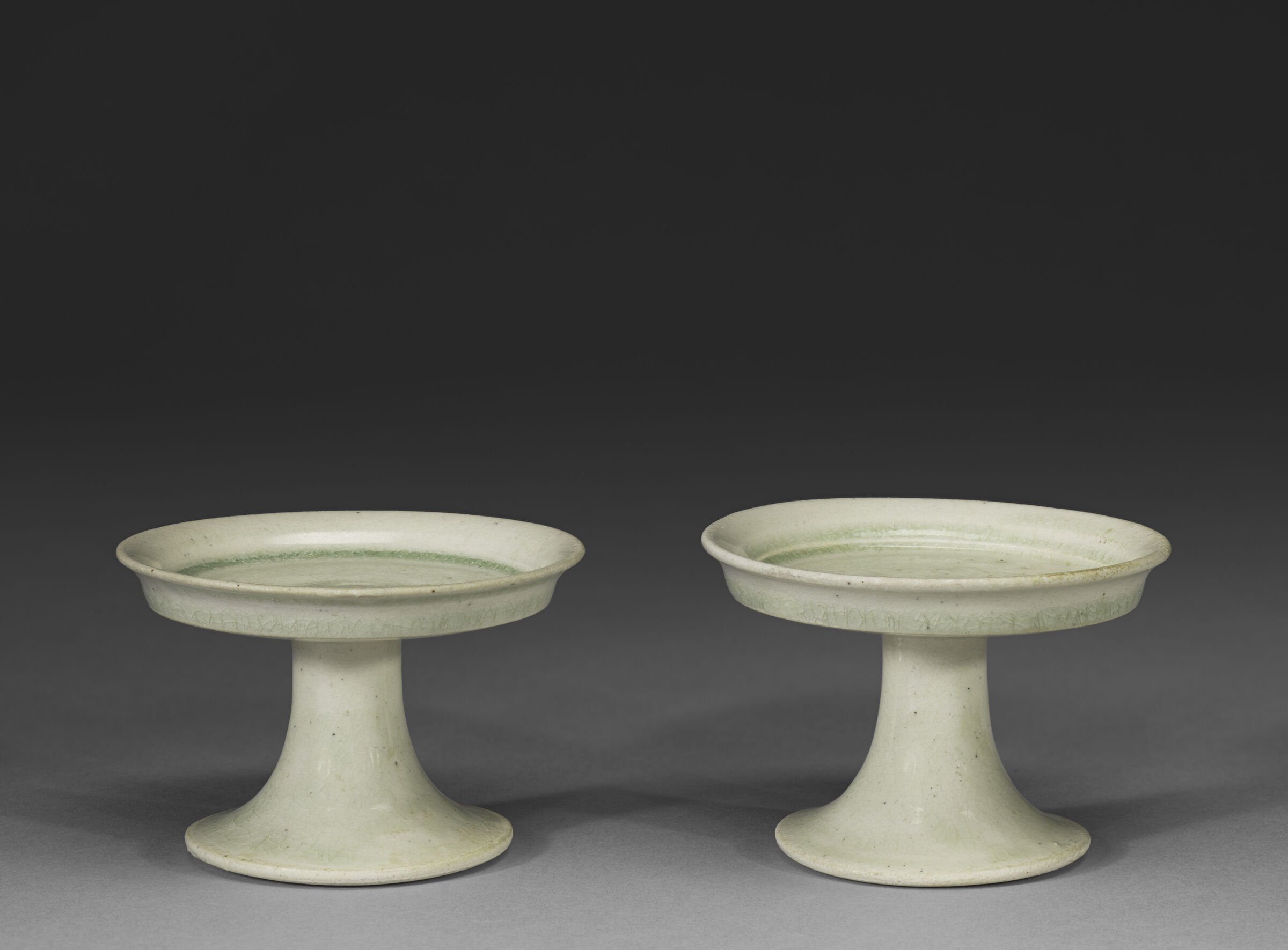 A Pair Of Small Pedestal Dishes