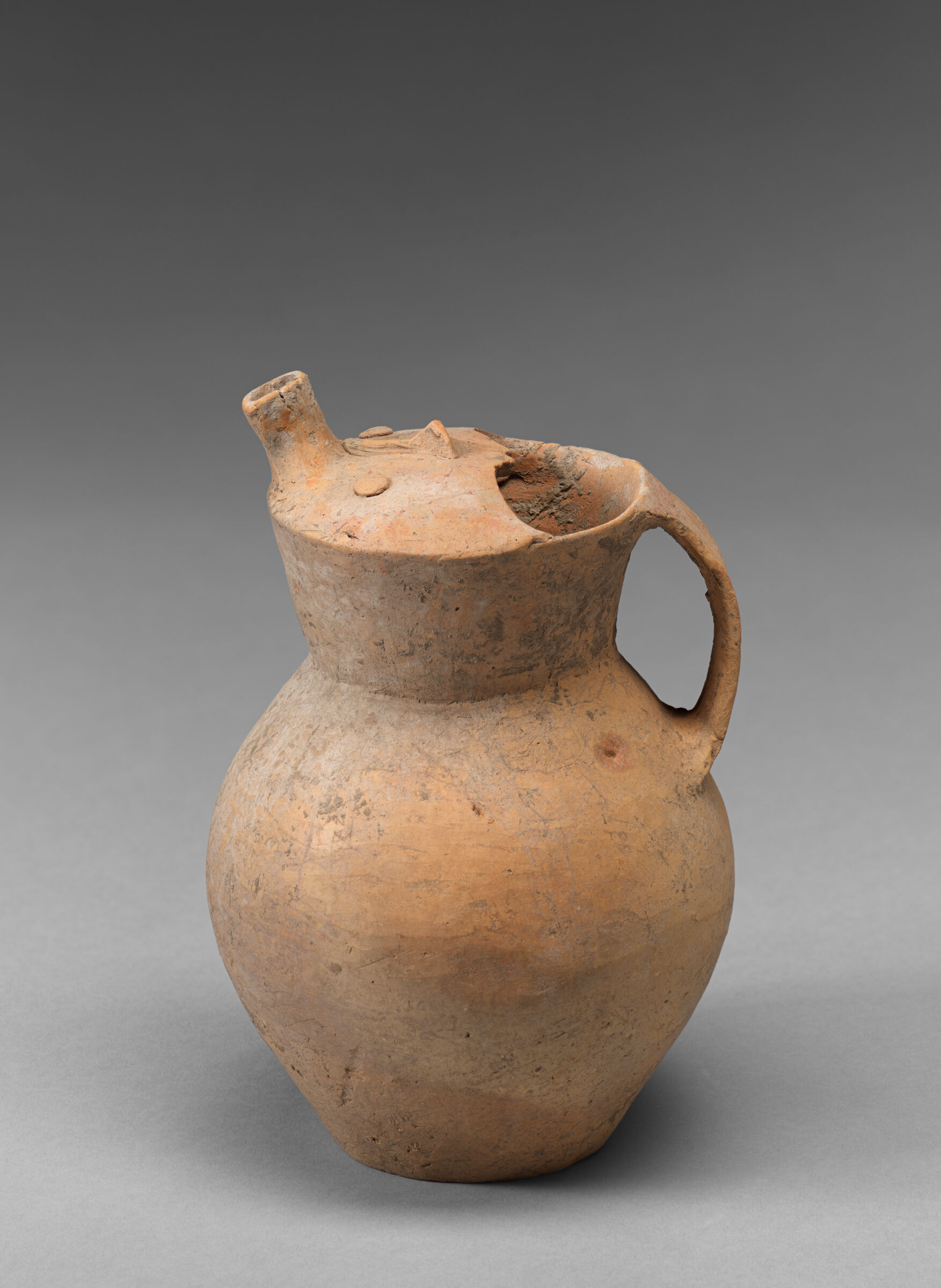 Spouted Jug With Anthropomorphic Top