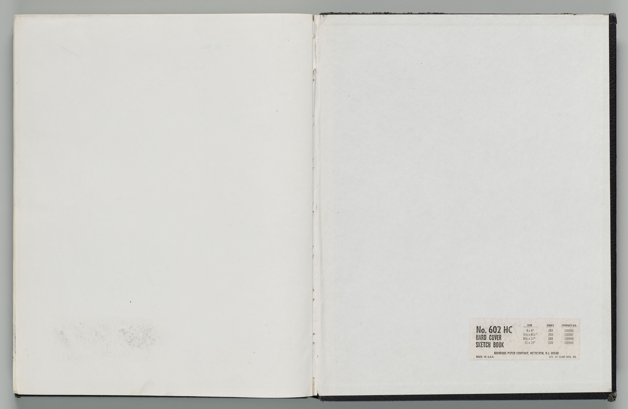 Untitled (Blank, Left Page); Untitled (Blank With Manufacturer's Sticker, Back Endpaper, Right Page)