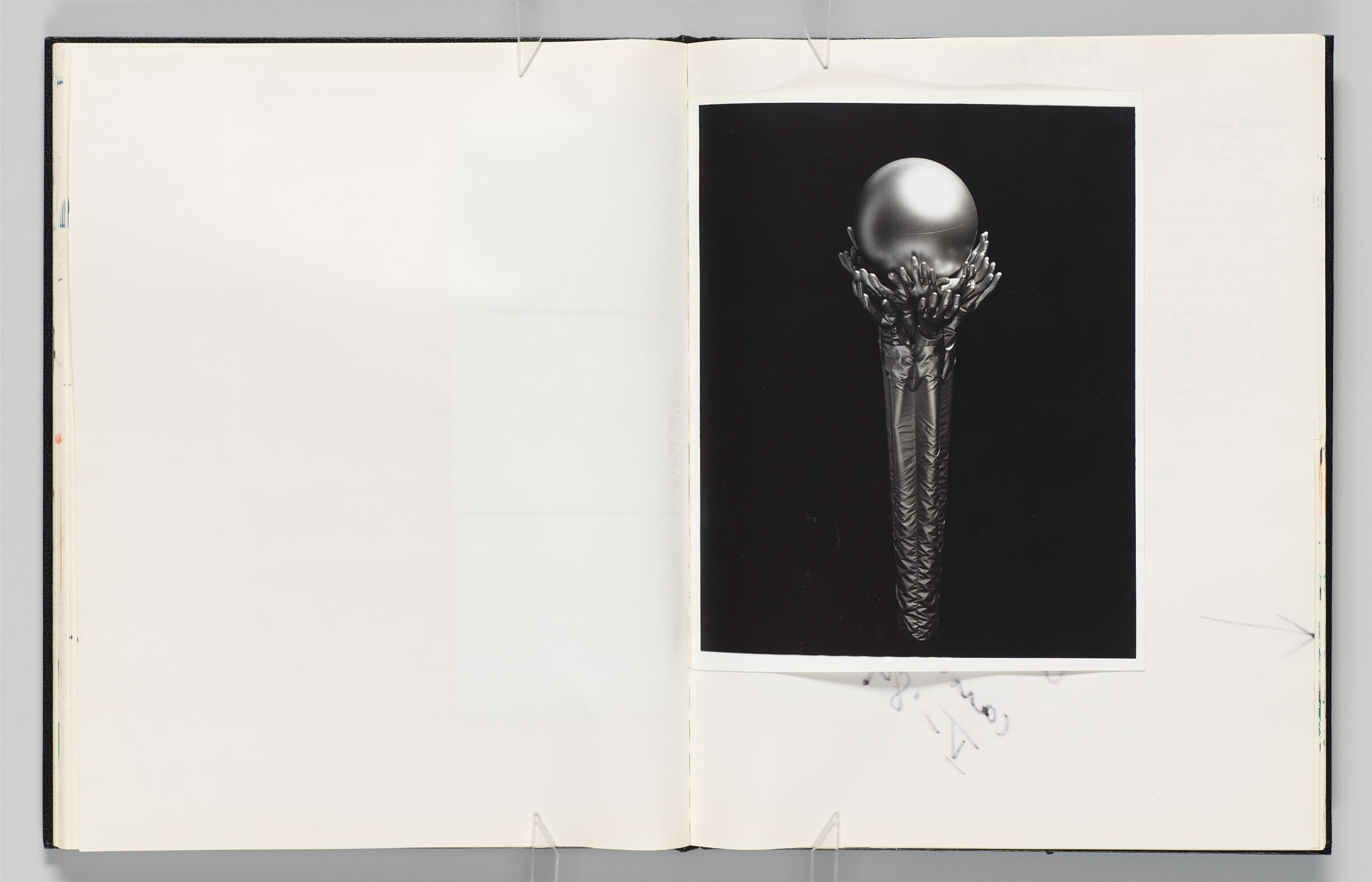 Untitled (Blank, Left Page); Untitled (Photographs Of Maquette (Hands Holding Globe), Right Page)
