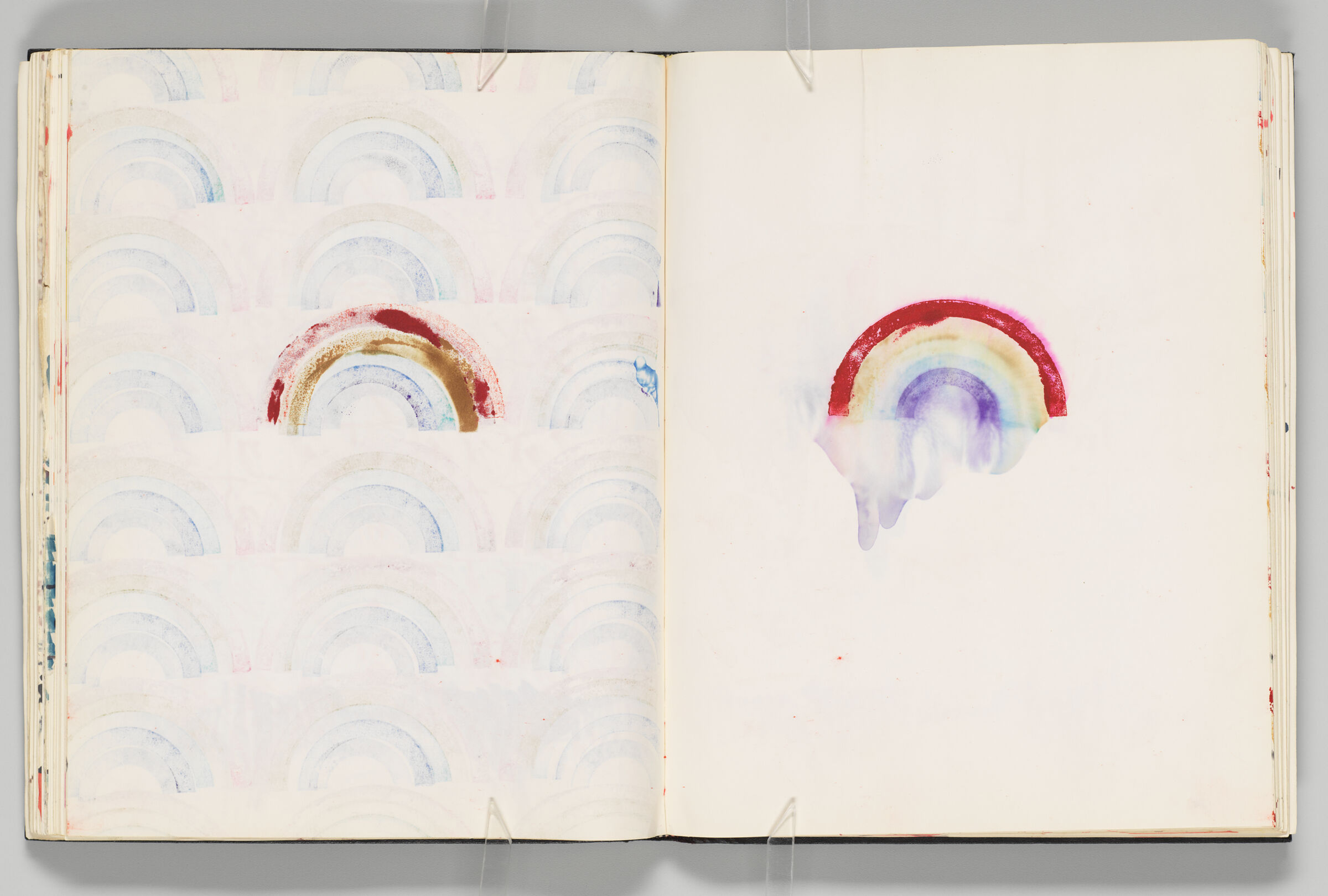 Untitled (Bleed-Through Of Previous Page, Left Page); Untitled (Rainbow Stamp Impression Manipulated With Water, Right Page)