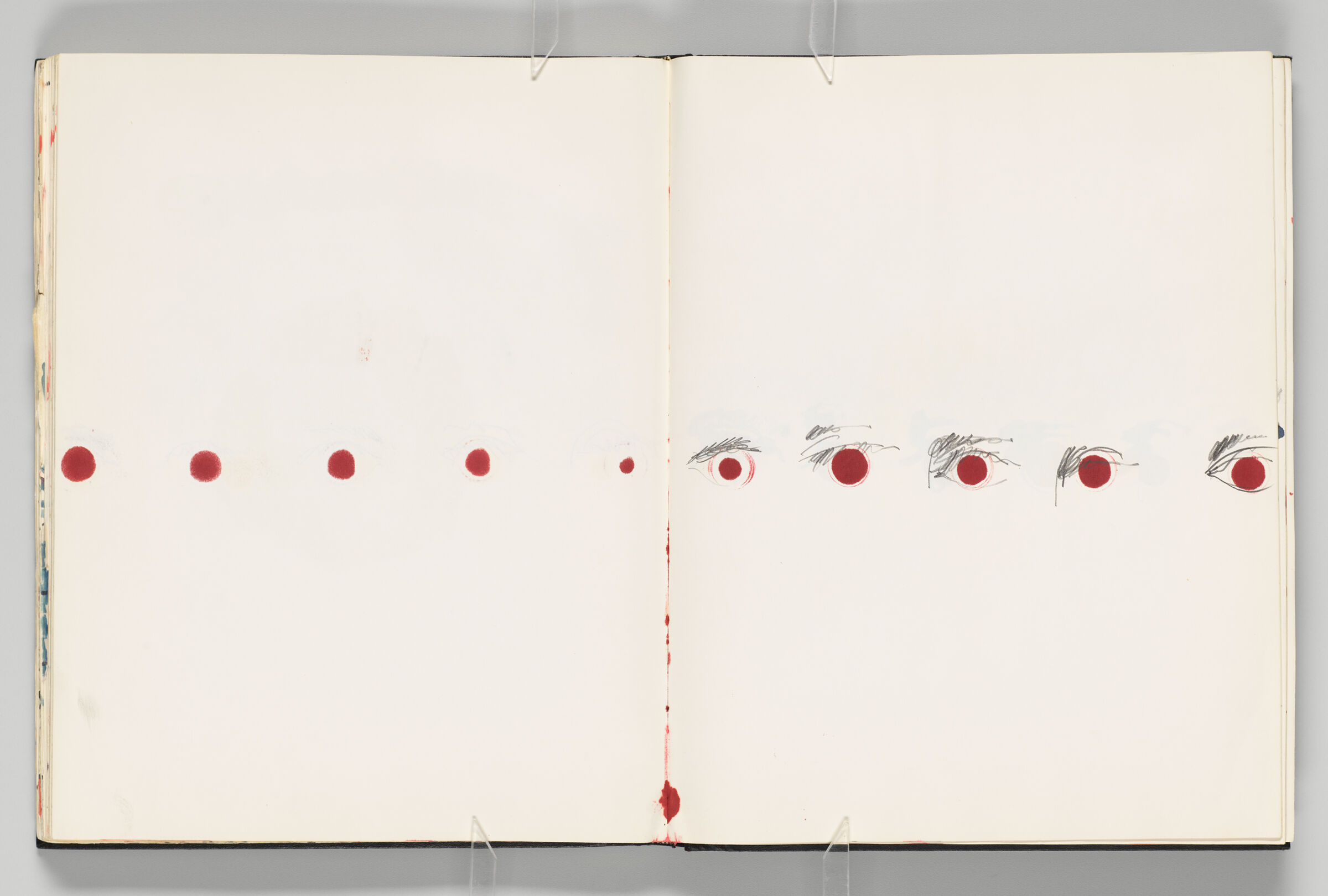 Untitled (Bleed-Through Of Previous Page, Left Page); Untitled (Row Of Eyes, Right Page)