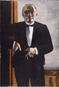 A portrait of a standing man wearing a tuxedo.