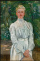 A portrait of a blonde woman in a white dress