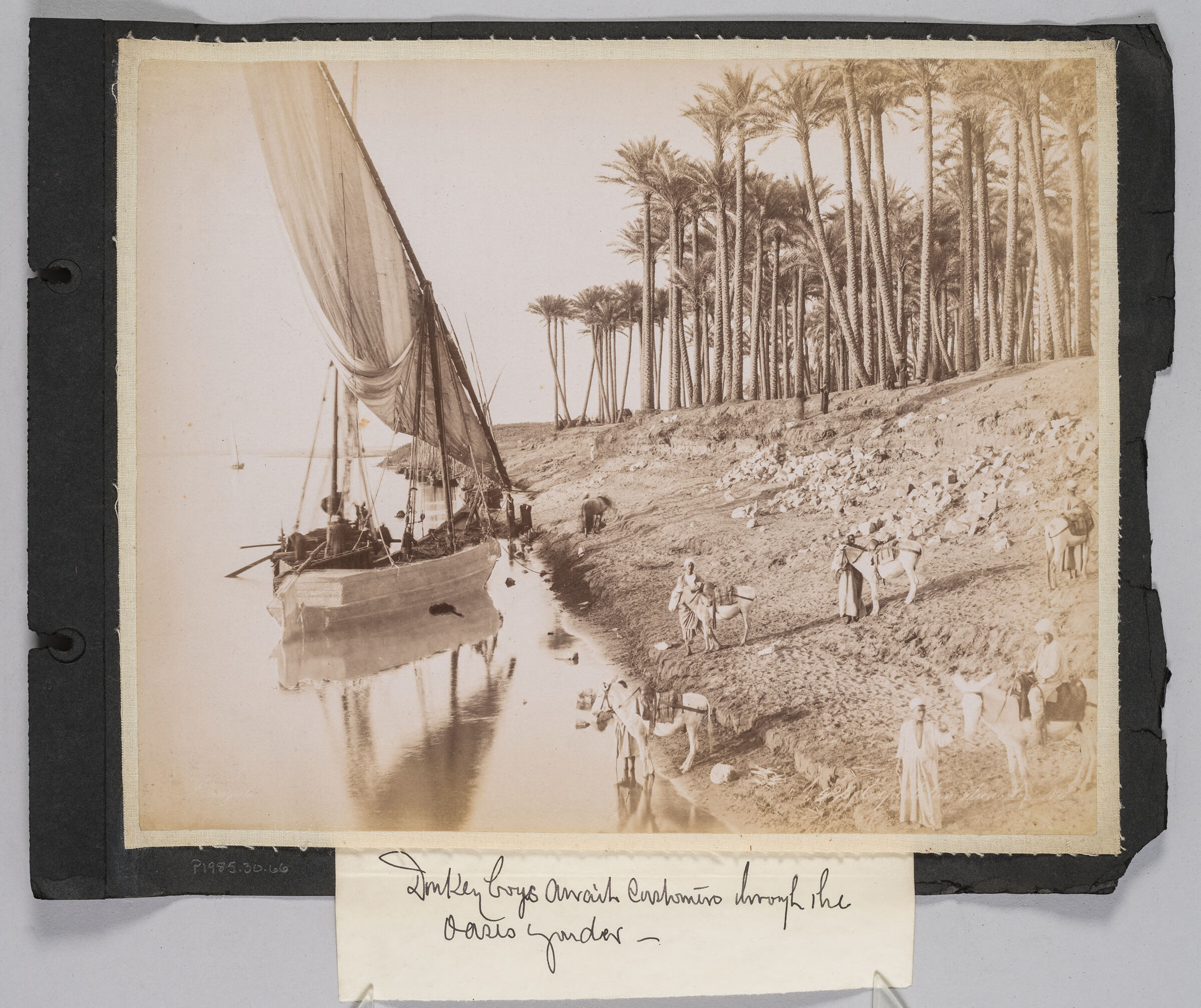Untitled (Sailboat Near The River Bank, Men With Donkeys On Shore, Palm Trees In The Background)