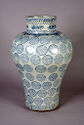 A wide shouldered white porcelain jar with geometric designs