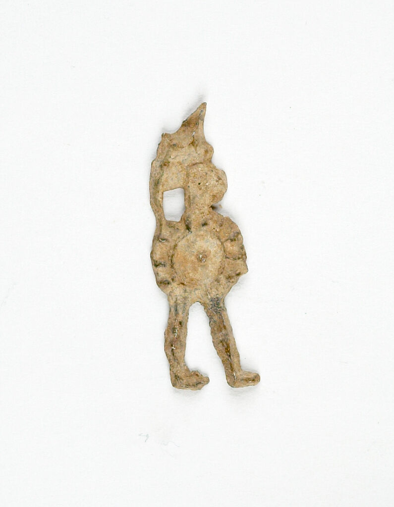 Votive Figure Of A Warrior With Helmet And Shield