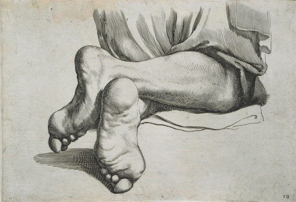 Two Legs Of A Man In A Kneeling Position