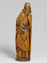 Wooden sculpture of a bearded man with a hat and no hands