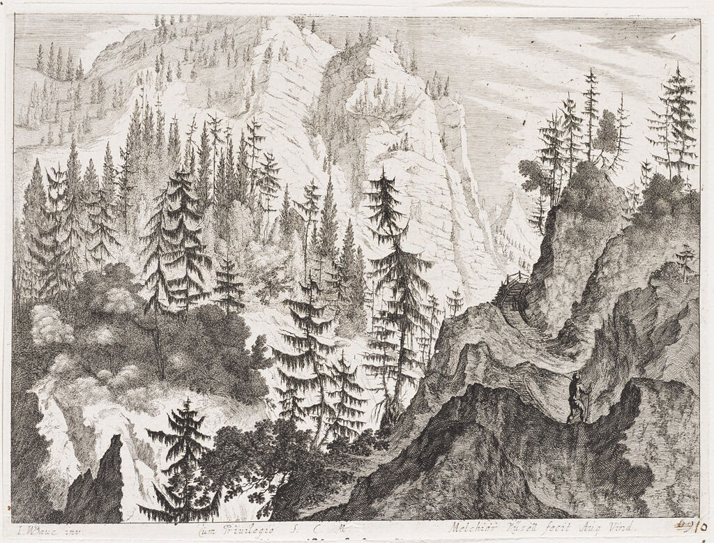 Mountains Spotted With Pine Trees And Man With Walking Stick Ascending A Path