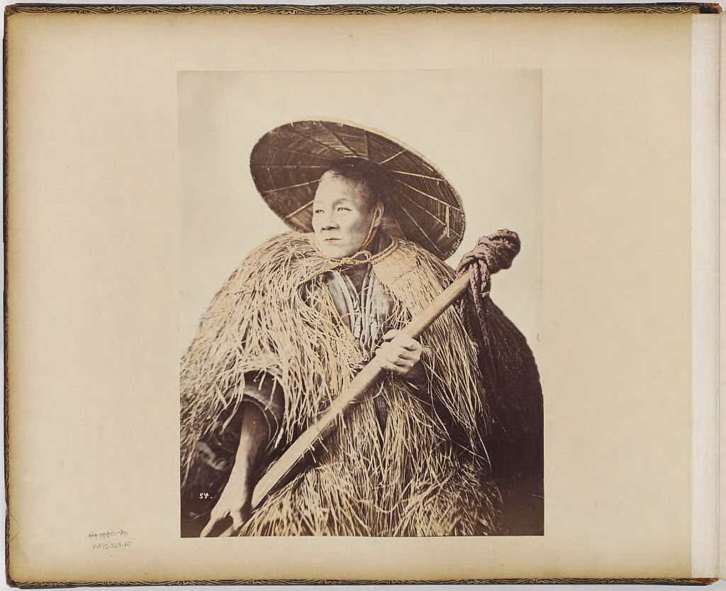 Untitled (Man With Straw Cape And Hat)