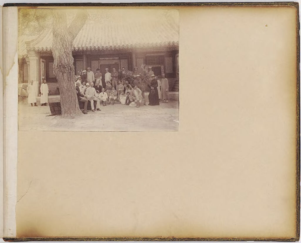 Untitled (Group Of People In Front Of A House)