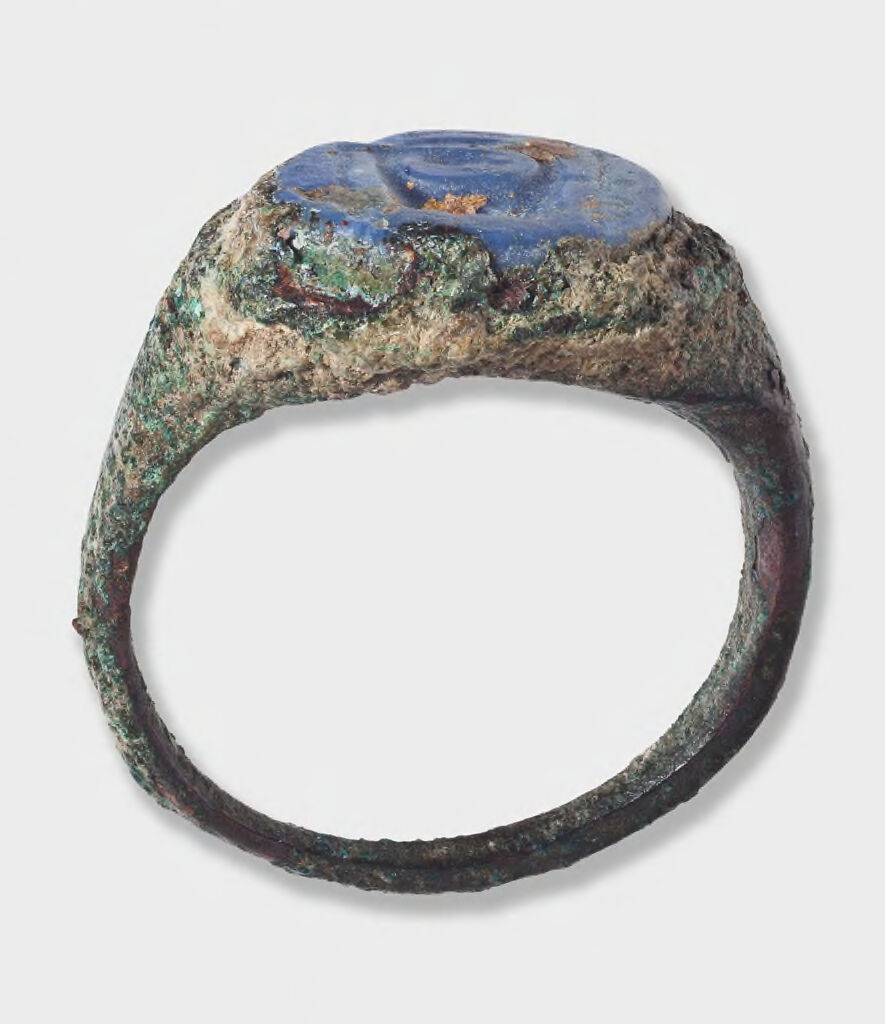 Ring With Blue Glass-Paste Gem Bearing Symbols