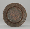 Brown copper dish with Qur’anic inscription and human-faced fish