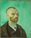 Self-portrait of a man off center and facing right against a vibrant aqua green background.