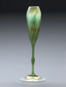 Green-and-white tulip-shaped glass vase