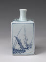 A white porcelain bottle decorated with blue botanical designs on each side