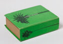 A printed book bound in green with a palm tree on the spine and front cover in black.
