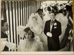 Untitled (Bride With Long Train Moving Through Crowd Of People)