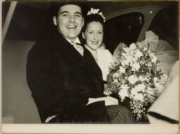 Untitled (Bride And Groom Seated In Backseat Of Car)