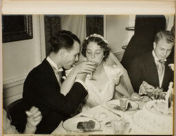 Untitled (Bride And Groom Drink From Each Other's Glass)