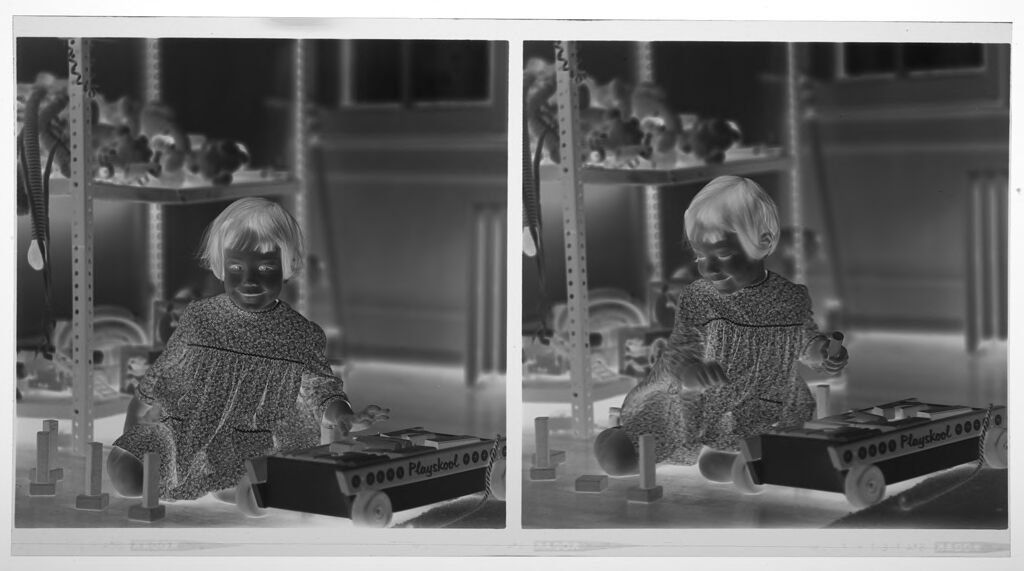 Untitled (Medium Format Images Of Girl Playing With Toys On Floor)