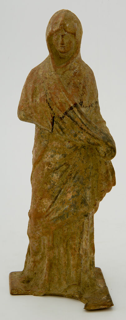 Standing Woman With Veiled Head
