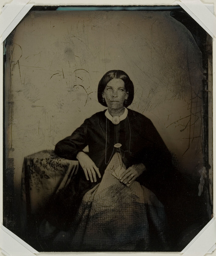Untitled (Young Woman Holding A Closed Book, Seated, Three-Quarter View)