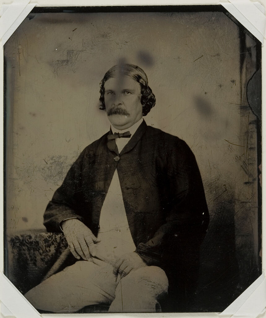 Untitled (Man With A Mustache And Wearing A Dark Coat, Seated, Three-Quarter View)