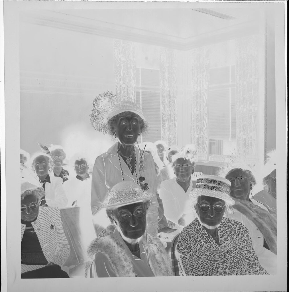 Untitled (Elderly Women Seated At Dar Meeting, One Woman Standing)