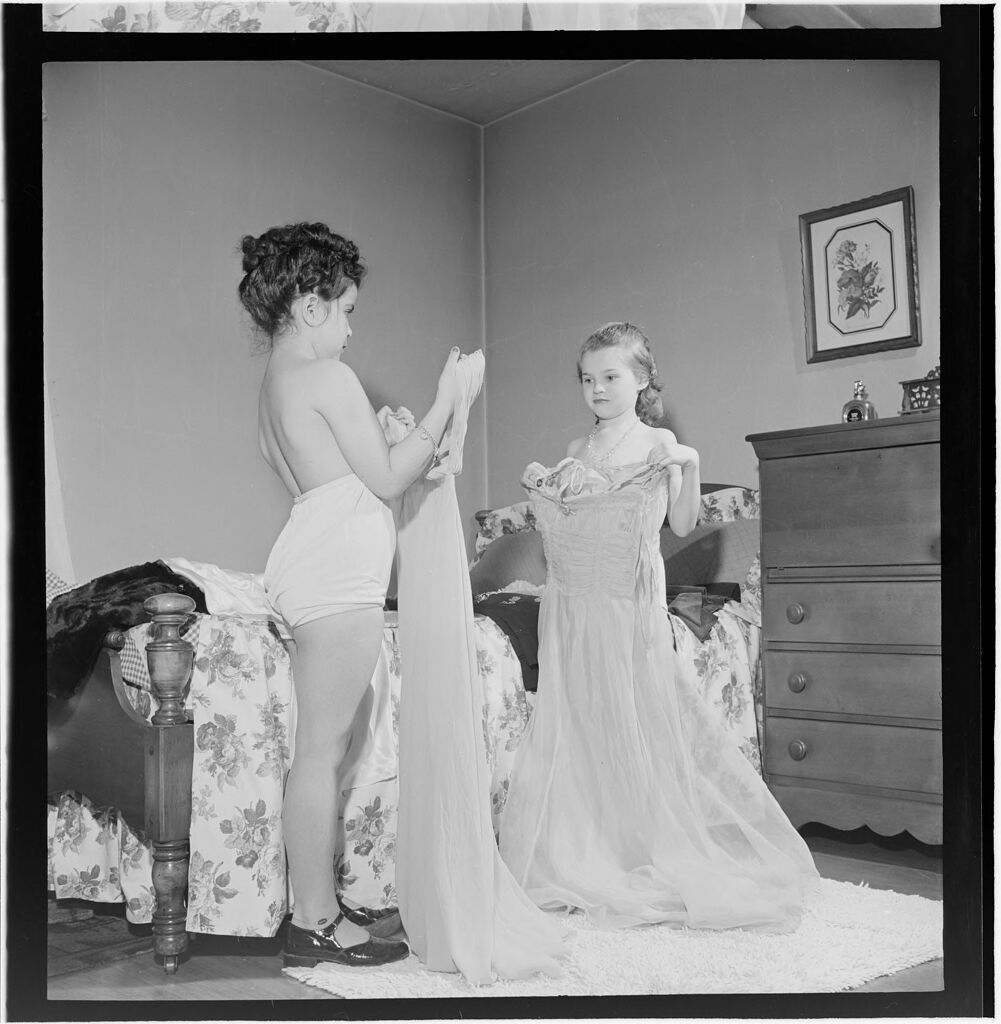 Untitled (Girls Playing Dress-Up And Trying On Clothes)