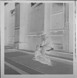 Untitled (Man And Dog Sitting In Front Of Building, New York City)