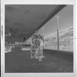 Untitled (Woman On Bicycle In Front Of Winn Dixie)