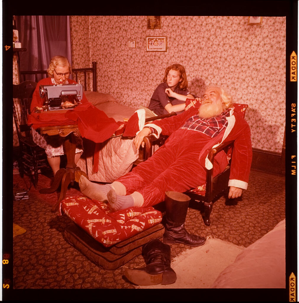 Untitled (Two Women With Man Dressed As Santa Claus)