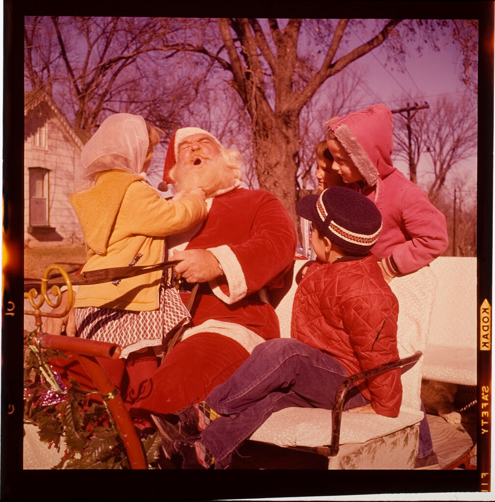 Untitled (Man Dressed As Santa Claus With Children)